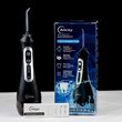 Irrigatore orale professionale Alinty AT77, 2000 impulsi, 5 testine, 3 velocità, serbatoio 200ml, ricarica USB, Nero